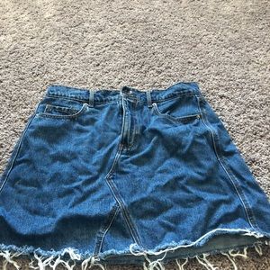 Denim skirt with raw hem